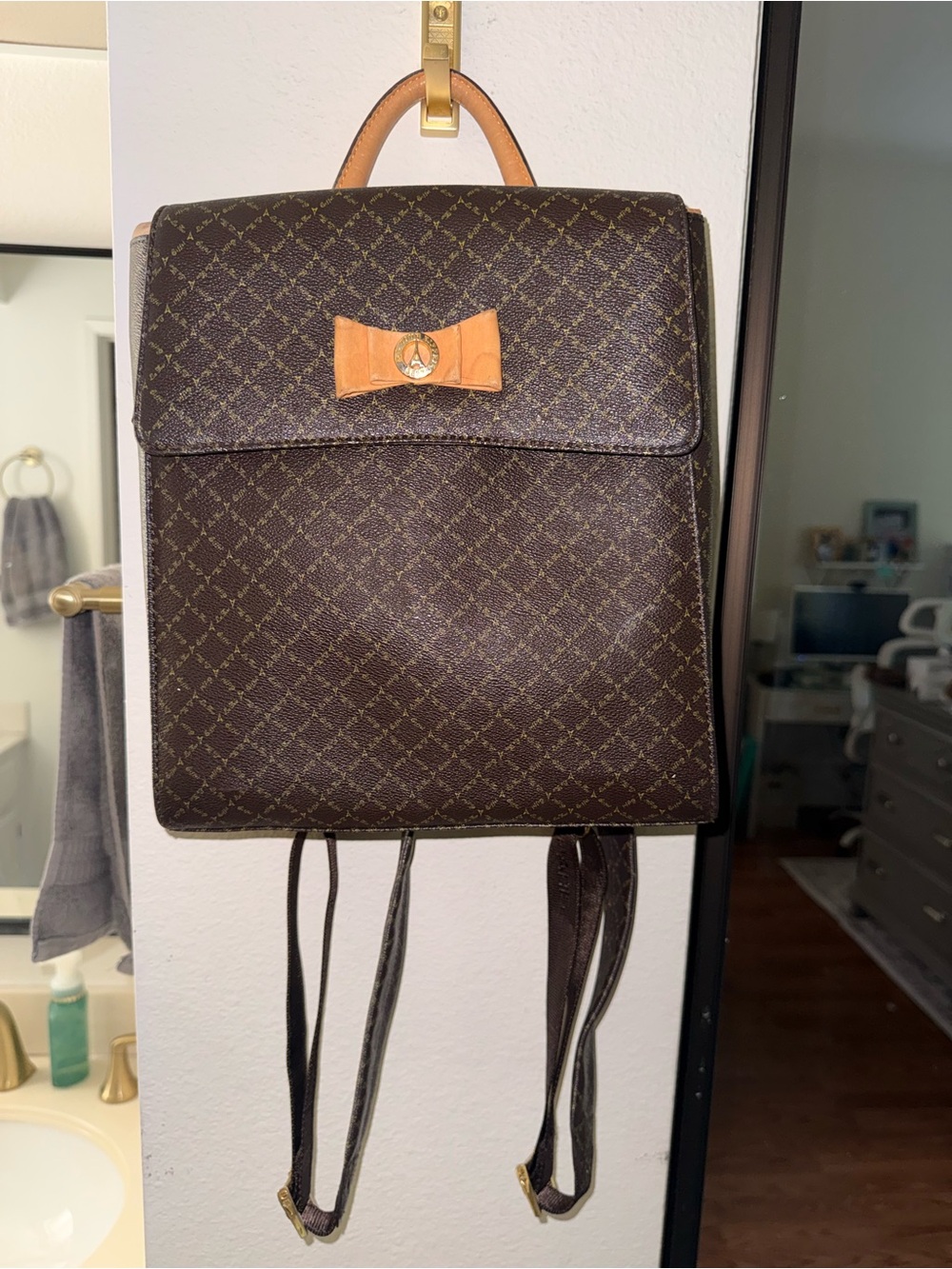 Rioni Brown Monogram Backpack and wallet with Tan Leather Bow Accent